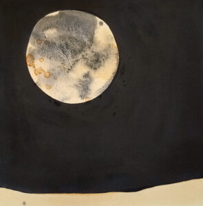 ink drawing of a moon over a barren landscape on a black background