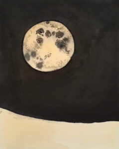 ink drawing of a moon over a barren landscape on a black background