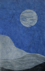 Woodcut print of an abstracted landscape with a moon above. The print is in shades of gray on navy blue paper.